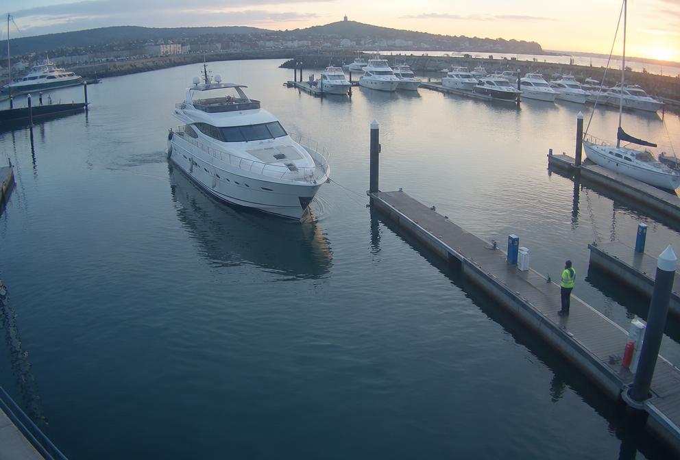 Marina berths with moored boats observed by an AI camera